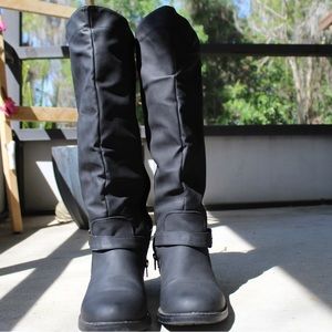 Midcalf black slip on boots with lace up in the back and zippers on the side